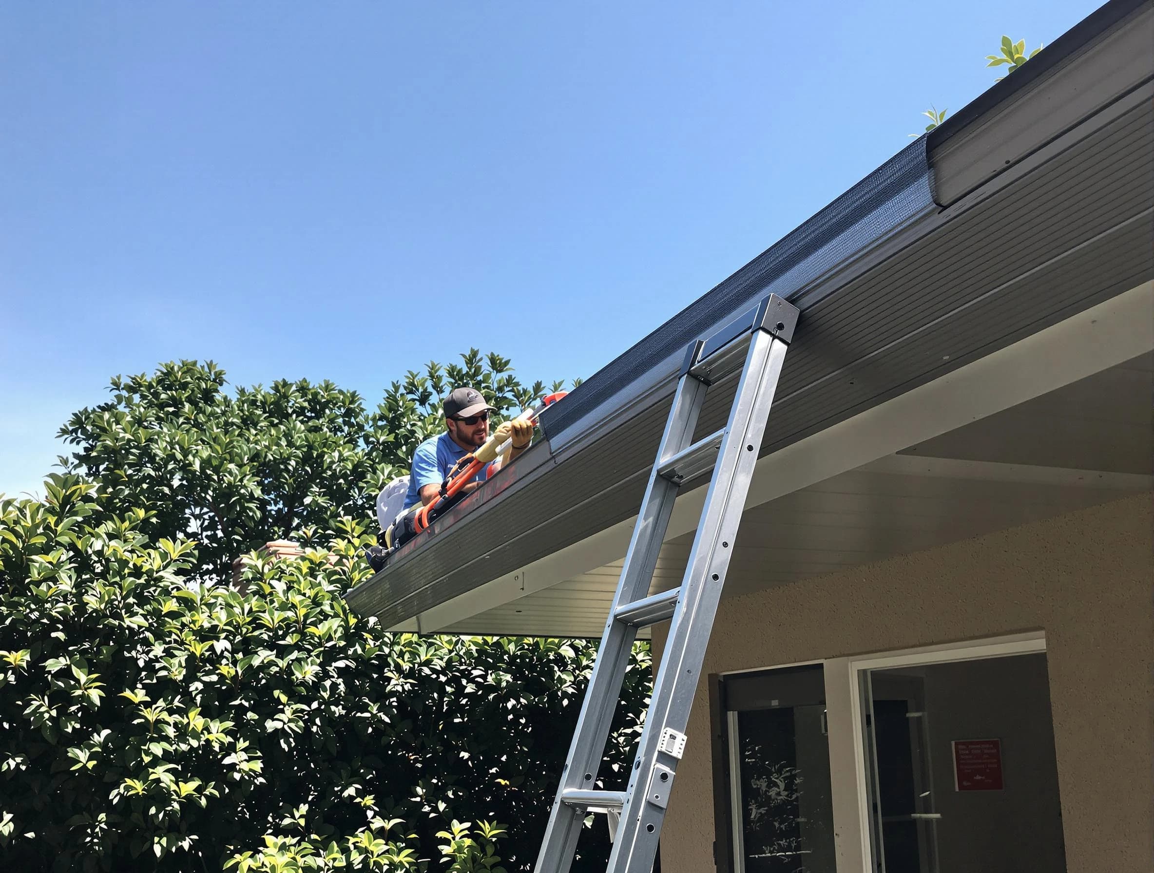 Macedonia Roofing Company installing gutter guards for a homeowner in Macedonia, OH