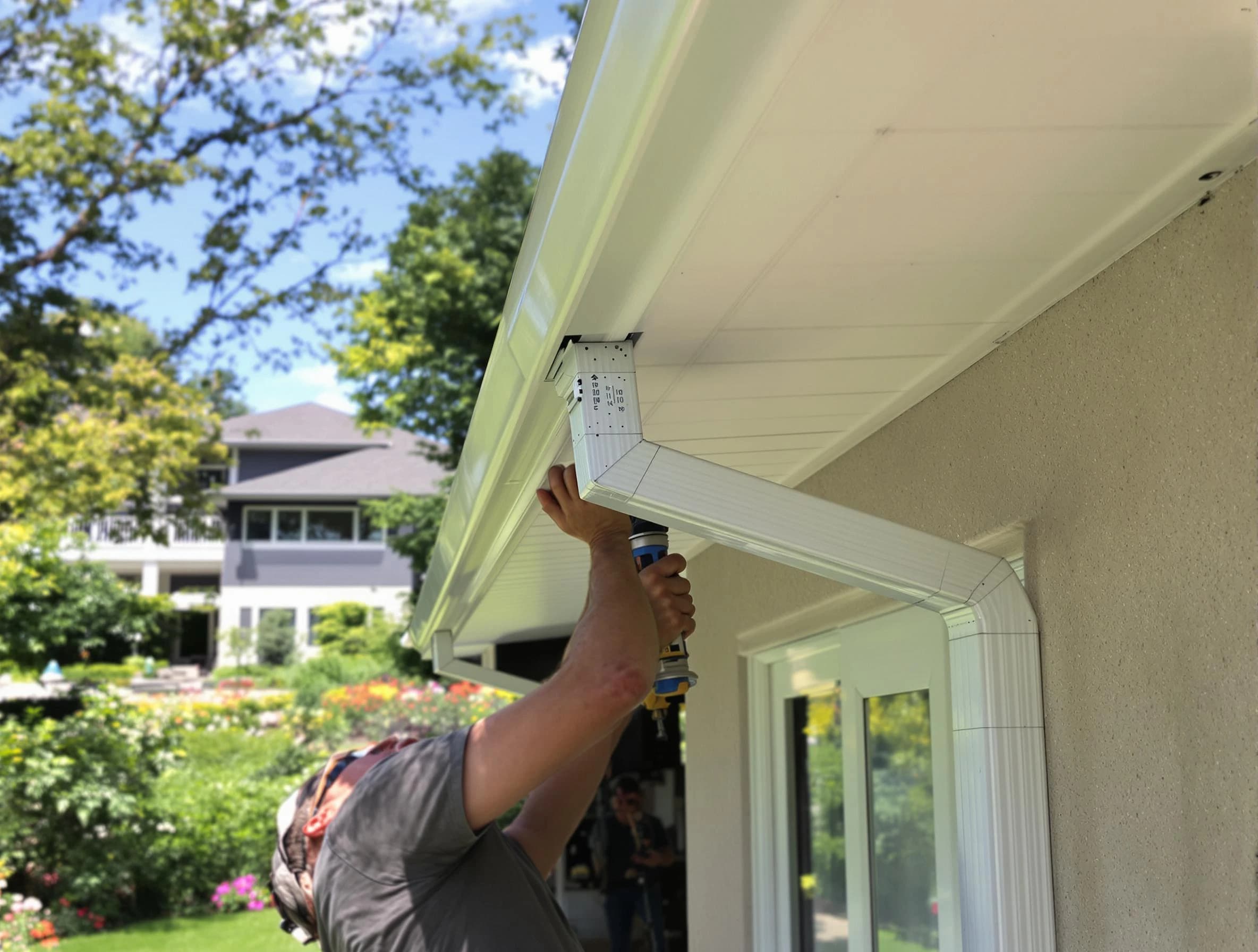 Macedonia Roofing Company technicians performing gutter installation in Macedonia, OH